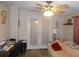 Living area with a home office space and French doors at 6546 Greenview Ct, North Port, FL 34287