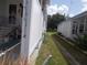 View of the side of the mobile home and neighboring property at 6546 Greenview Ct, North Port, FL 34287