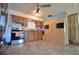 Bright kitchen with stainless steel appliances, modern cabinetry and tile flooring at 11332 8Th Ave, Punta Gorda, FL 33955