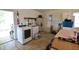 Laundry room with washer, dryer, and storage at 11332 8Th Ave, Punta Gorda, FL 33955