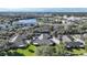 Single-story home in a community with a lake at 1152 Green Oak Trl, Port Charlotte, FL 33948