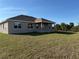 This home has a large backyard area, and is partially covered by shade at 13480 Allentown Ave, Port Charlotte, FL 33981