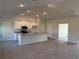 Spacious kitchen featuring a center island, modern appliances, and recessed lighting at 13480 Allentown Ave, Port Charlotte, FL 33981