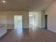 Bright and airy living room with tile floors and an open layout perfect for entertaining at 13480 Allentown Ave, Port Charlotte, FL 33981
