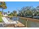 Enjoy waterfront living on this private dock with lounge chair at 1542 Yorkshire St, Port Charlotte, FL 33952