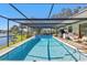 Relaxing, refreshing pool with screened enclosure and canal views at 1542 Yorkshire St, Port Charlotte, FL 33952