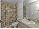 Clean bathroom with shower/tub combo and updated vanity at 1811 Music Ln, North Port, FL 34286