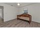 Bedroom with wood-look flooring and a built-in daybed at 1811 Music Ln, North Port, FL 34286