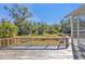 Large wooden deck with scenic backyard views at 1811 Music Ln, North Port, FL 34286