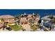 Luxury waterfront home with tile roof, solar panels, and landscaping at 2102 Palm Tree Dr, Punta Gorda, FL 33950