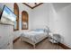 Bright bedroom with hardwood floors and windows at 2102 Palm Tree Dr, Punta Gorda, FL 33950