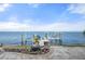 Private dock with boat lift and waterfront views at 2102 Palm Tree Dr, Punta Gorda, FL 33950
