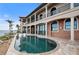 Backyard with pool and waterfront views at 2102 Palm Tree Dr, Punta Gorda, FL 33950