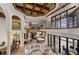 Open concept living area with view of kitchen, dining room, balcony, and pool at 2102 Palm Tree Dr, Punta Gorda, FL 33950