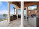 Outdoor kitchen with grill, sink, and countertop at 2102 Palm Tree Dr, Punta Gorda, FL 33950