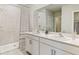 Double vanity bathroom with a large shower and modern fixtures at 215 Angol St, Punta Gorda, FL 33983