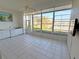 Sunroom with water views and kitchenette at 2630 Tarpon Cove Dr # 211, Punta Gorda, FL 33950