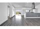 Open concept living area with modern kitchen and access to a patio at 3004 Banyan Way, Punta Gorda, FL 33950