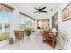 Florida room with wicker furniture, ceiling fan, and view of the canal at 3310 Tripoli Blvd, Punta Gorda, FL 33950