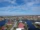Wide shot of waterfront community with many houses at 3448 Nighthawk Ct, Punta Gorda, FL 33950