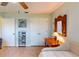 Bedroom with daybed, built-in shelving and ceiling fan at 3448 Nighthawk Ct, Punta Gorda, FL 33950