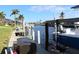 Private boat dock with lift and storage space at 3448 Nighthawk Ct, Punta Gorda, FL 33950