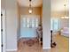 Bright entryway with tile flooring and double doors leading into the home at 3448 Nighthawk Ct, Punta Gorda, FL 33950