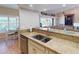 Modern kitchen with stainless steel appliances and granite countertops at 3448 Nighthawk Ct, Punta Gorda, FL 33950
