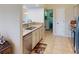 Kitchen boasts granite countertops, stainless steel appliances, and ample cabinet space at 3448 Nighthawk Ct, Punta Gorda, FL 33950