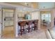 Kitchen features granite countertops, stainless steel appliances, and a breakfast bar at 3448 Nighthawk Ct, Punta Gorda, FL 33950
