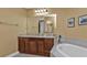 Bathroom with granite countertop vanity and bathtub at 99 Vivante Blvd # 312, Punta Gorda, FL 33950