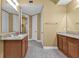 Bathroom with granite countertop double vanity at 99 Vivante Blvd # 312, Punta Gorda, FL 33950