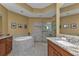 Spa-like bathroom with soaking tub and walk-in shower at 99 Vivante Blvd # 312, Punta Gorda, FL 33950