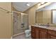 Bathroom with shower, toilet and granite countertop at 99 Vivante Blvd # 312, Punta Gorda, FL 33950