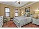 Spacious bedroom with a comfortable queen-size bed and hardwood floors at 99 Vivante Blvd # 312, Punta Gorda, FL 33950