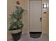 Inviting entryway with modern door and potted plant at 99 Vivante Blvd # 312, Punta Gorda, FL 33950