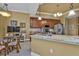 Updated kitchen with granite counters and breakfast bar at 99 Vivante Blvd # 312, Punta Gorda, FL 33950
