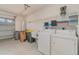 Laundry room with washer, dryer, and garage access at 10494 Princess Ct, Punta Gorda, FL 33955