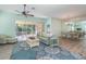 Open living and dining space with light walls and hardwood floors at 10494 Princess Ct, Punta Gorda, FL 33955