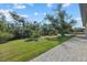 Backyard with paver patio and grassy area at 1254 Miliken Ter, Port Charlotte, FL 33953