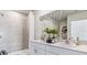 Clean bathroom with double vanity, shower, and modern fixtures at 1428 Powell Valley Dr, Port Charlotte, FL 33953