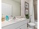 Bathroom with single vanity, toilet, and shower/tub combo at 1428 Powell Valley Dr, Port Charlotte, FL 33953