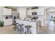 Modern kitchen with white cabinets, stainless steel appliances, and an island at 1428 Powell Valley Dr, Port Charlotte, FL 33953