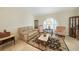 Living area with arched window, and seating arrangement at 1600 Redwing Ct, Punta Gorda, FL 33950