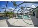 Enclosed pool and spa with canal views at 1600 Redwing Ct, Punta Gorda, FL 33950