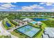 Community overview showing tennis courts and pool area at 2051 Royal Tern Cir, Punta Gorda, FL 33983