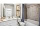Bathroom features a toilet, sink, and bathtub at 2051 Royal Tern Cir, Punta Gorda, FL 33983