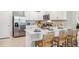 Modern kitchen with white cabinets, stainless steel appliances, and an island at 2051 Royal Tern Cir, Punta Gorda, FL 33983