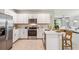 Modern kitchen with white cabinets and stainless steel appliances at 2051 Royal Tern Cir, Punta Gorda, FL 33983