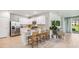 Modern kitchen with white cabinets, stainless steel appliances, and an island at 2051 Royal Tern Cir, Punta Gorda, FL 33983